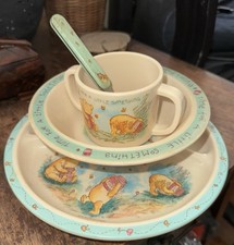 Winnie the Pooh Child's Dinner Set with Plate, Cup, Spoon, And Bowl.