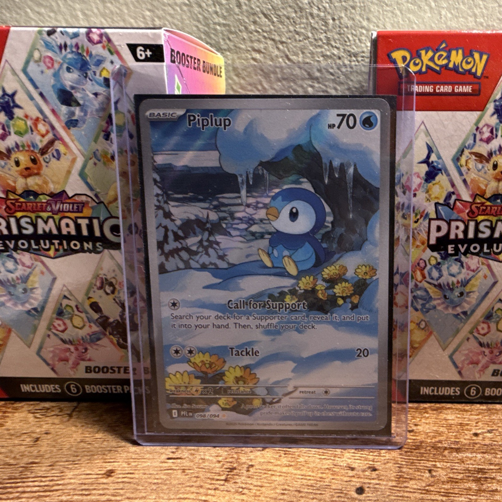 The Pokémon Company Piplup 098/094 Me02 Phantasmal Flames IR Reverse Holo ENG