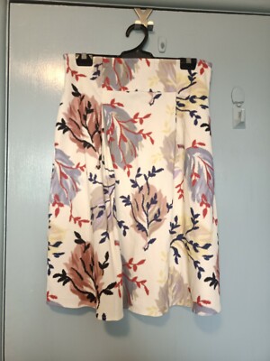 Max & Co cream skirt with red and black for a patterns in size 12