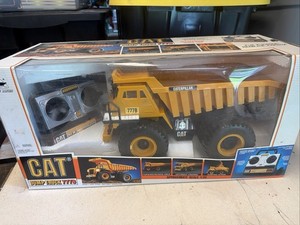 New Bright Remote Control CAT 777B Dumb Truck  1/20 Scale