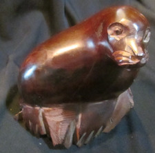 Heavy 5 1/4" High X 5 1/8" Long Handcarved & Polished Wood Walrus On Rock Paper