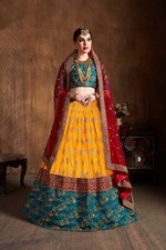 Presenting Banarasi Silk Yellow Lehenga Choli With Red Dupatta For Wedding Wear