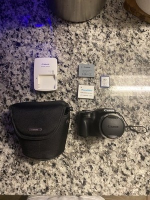 Canon PowerShot SX510 HS Digital Camera, 2 batteries, charger, 32M SD card, case