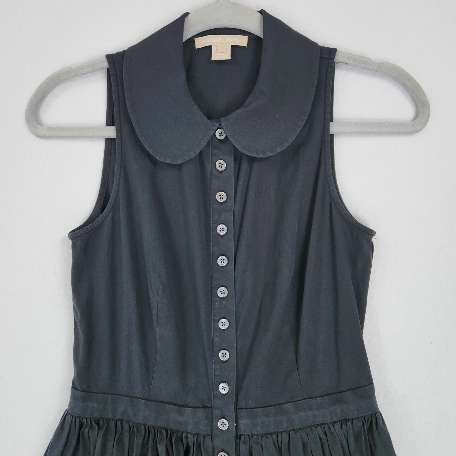 Abito Michael Kors donna 2 lavati nero linea A senza maniche bottoni plissettato davanti