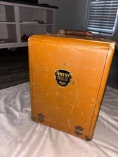 Vintage Ampro precision projector in case with accessories includes sales ticket