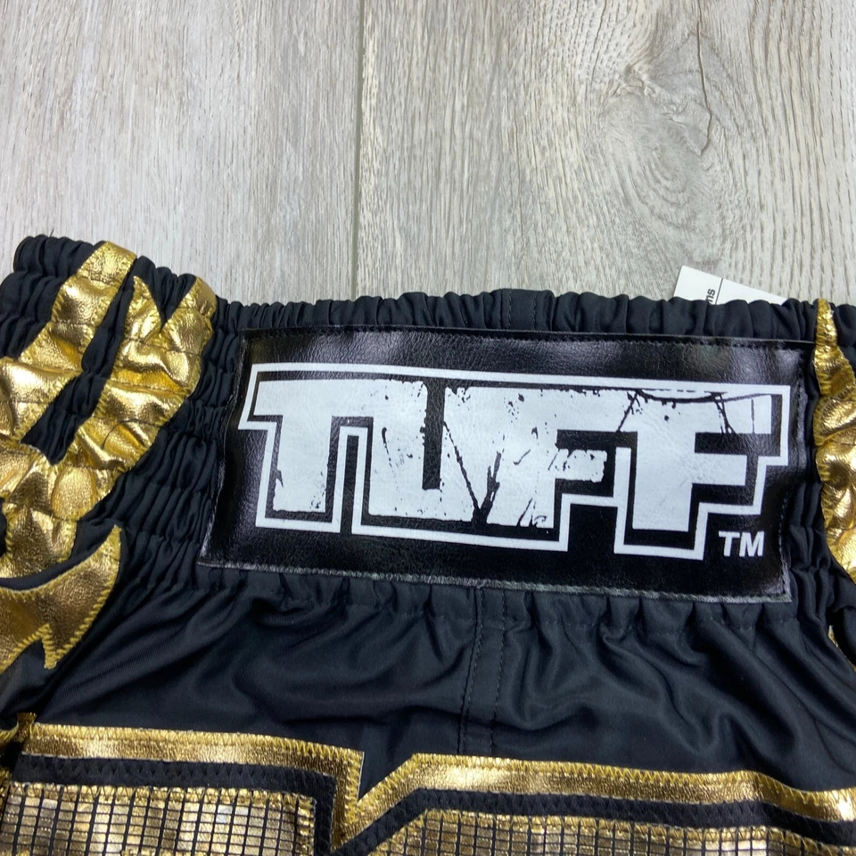 Baúles de Boxeo Tuff Muay Thai Talla Pequeña Negro Dorado Elastizados Lucha S TUF-MS 437 Foto 2 de 4