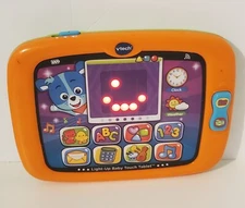VTech Light Up Baby Touch Tablet.  Works.  Missing Battery Cover