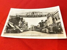 postcard RPPC 1941 RENO NV, Herz Jewelry, Monarch Cafe, Silver Grill, Lerner 