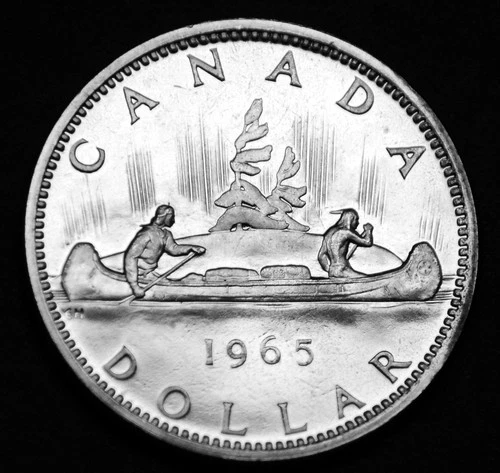 1965 $1 silver coin that is a great coin and in a paper flip. Gorgeous