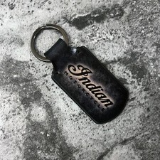 Handmade leather keychain with Indian Logo in Black. 1EA