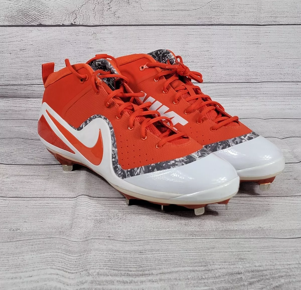 White and orange sales baseball cleats