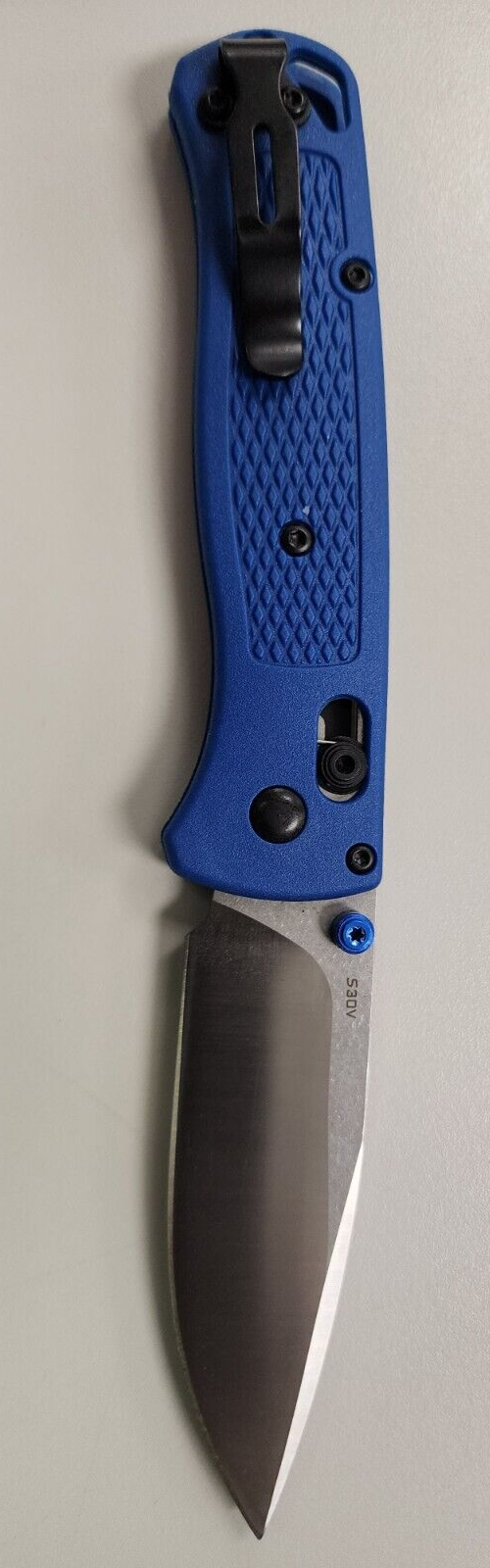 Not a benchmade knife. Blue Handle, Stainless Steel Blade Manual