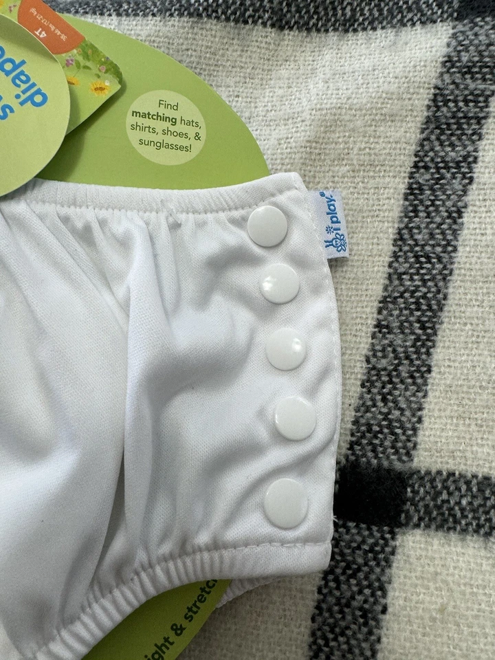 Pañal de natación absorbente reutilizable a presión unisex para bebé Iplay blanco talla 4T Foto 2 de 4