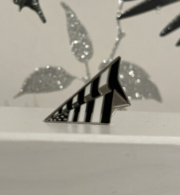 roc nation paper planes pin