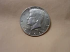 1966 Kennedy Half Dollar 40% Silver Coin! This coin appears to be circulated.