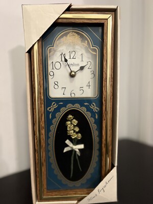 Vintage Ingraham Wall Clock with Gold Rose. Brand new still in the Box
