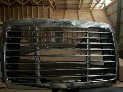 Freightliner Cascadia grille with logo and winter guard mounts genuine oem