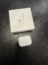 Apple AirPods Pro A2190 with Wireless Charging Case - White. One AirPod is Blown