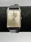 Vintage 70s Timex Men's Silver Tone Tank Watch Sunburst Dial Black Leather Strap