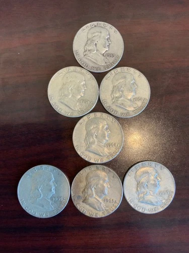 Lot of 7 silver Benjamin Franklin half dollar coins
