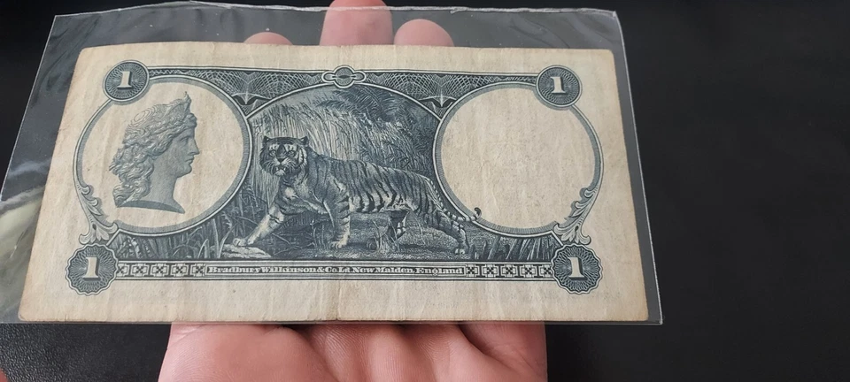 Billete de un dólar genuino de 1935 del Gobierno del Estrecho de Singapur Top Foto 2 de 4