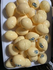 Lot of 32 empty Jurassic World mystery coin eggs for crafts and such.