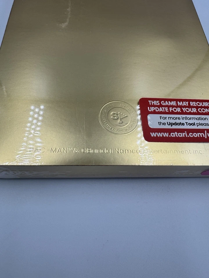 SDCC 2025 EXCLUSIVE ATARI GOLD EDITION PAC-MAN PINK CARTRIDGE VARIANT LE 1000 NM - Image 4 of 4