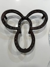 vintage horseshoes, used as a rustic kitchen accessory or a symbol of good luck.
