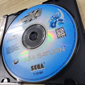 USED AUTHENTIC WORKING -) MEGA MAN X4 (- GAME DISC ONLY - SEGA SATURN