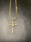 Gold-tone cross pendant necklace with rhinestone or crystal embellishments. — photo 2