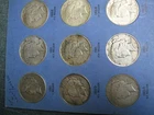 1921-1935 Peace dollar complete 24 coin set in a Whitman folder. Mixed cond