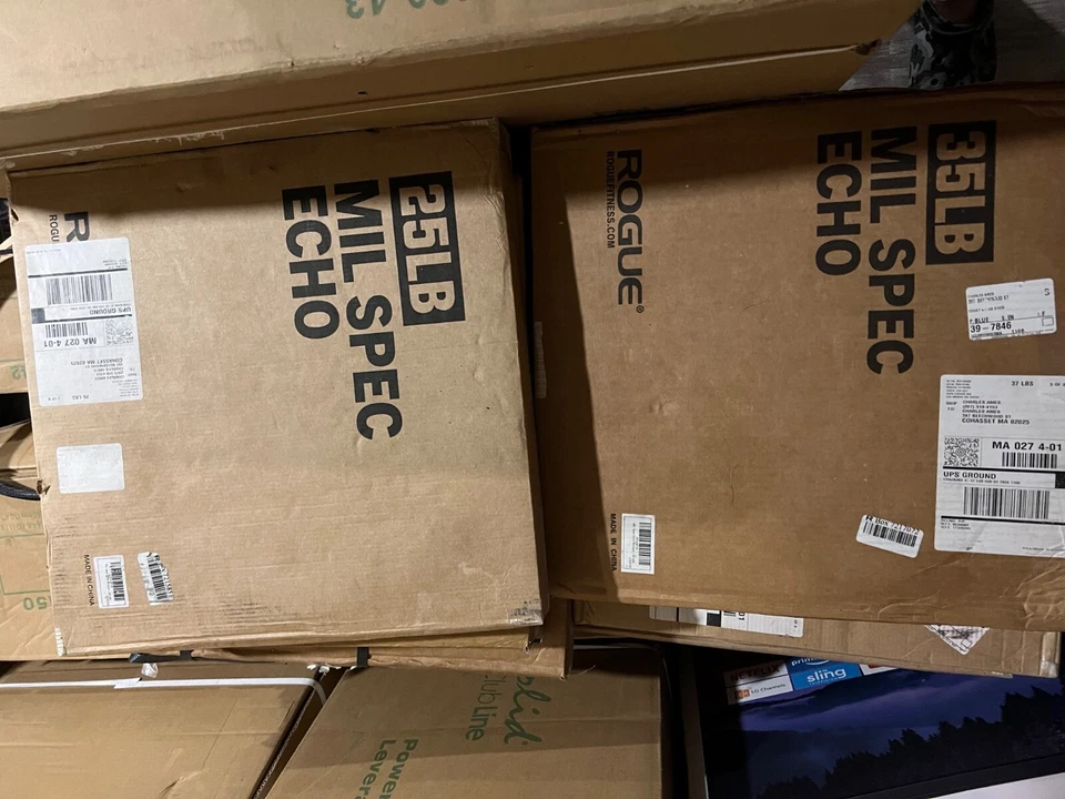 Body Solid Leverage Gym still in boxes. Also is 260 lbs Rogue Bumper Plate set. - Image 3 of 4