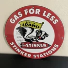 VINTAGE STINKER STATIONS SKUNK OIL MOTOR GASOLINE PORCELAIN SIGN