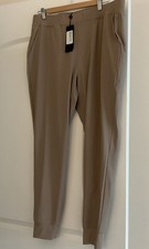 New Greyson Golf Phoenix Jogger Pants Womens Size Large. Clay Tan