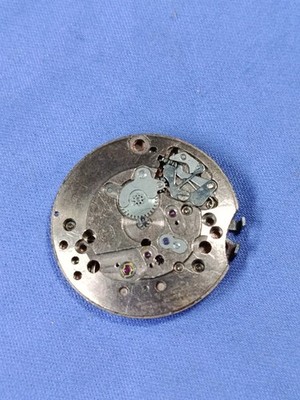 Unusual FHF 73  watch movement  Balance is good . swiss