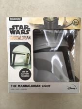 Star Wars The Mandalorian Light By Paladone Helmet Lamp and a pair of socks