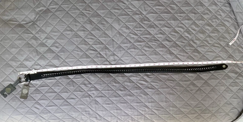 Cinturón de moda Vince Camuto negro con detalles de metal plateado talla L  Foto 2 de 4