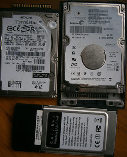 2 Hard drives(seagate 40gb Travelstar 60gb ) & 1 Wireless Lan Card 2.4Ghz 54Mbs