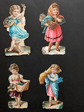 Girls collecting flaura and wood scraps