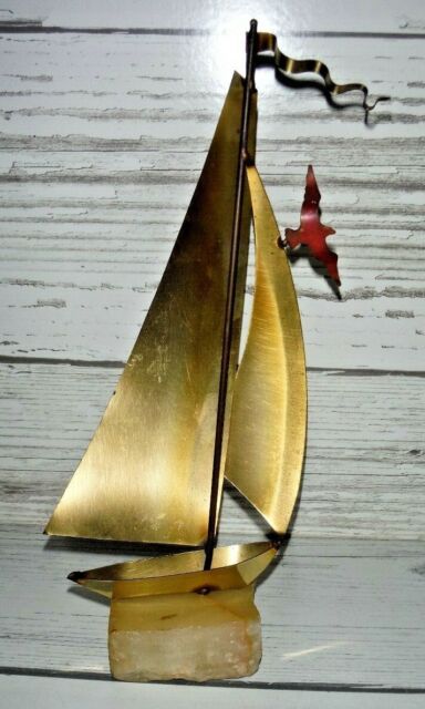 signed brass sailboat