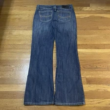 Woman’s Vintage Distressed Faded Y2K denim Bootcut Jeans 34x31