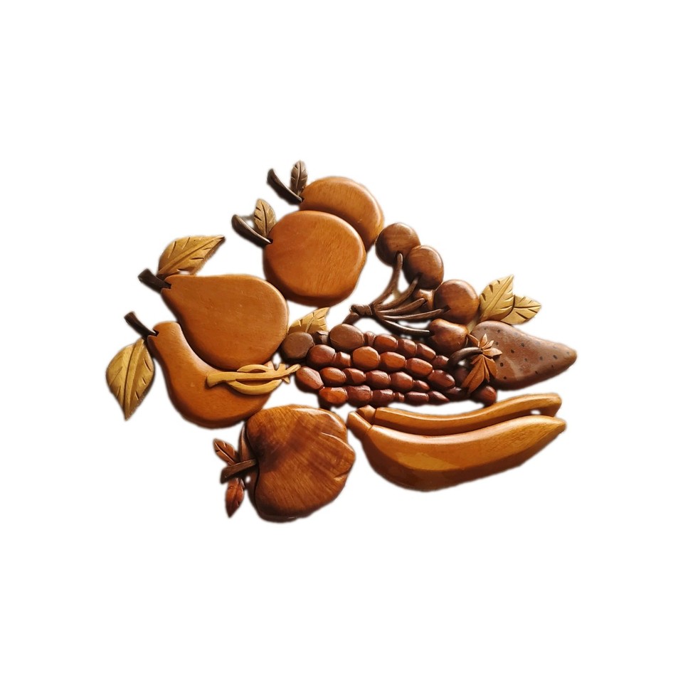 Actual hand-carved 3D wood fruit wall art from a past era — a tactile, sculptural piece that zero other people have on their wall.