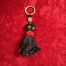 Black Tassel Keychain with Red Knot and Silver Floral Bead Bag Charm Accessory