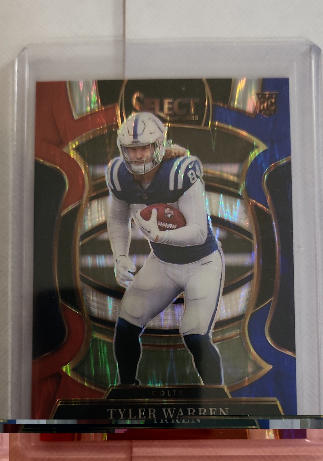 2025 Panini Select - Concourse Tyler Warren #33 Red & Blue Shock Prizm (RC)