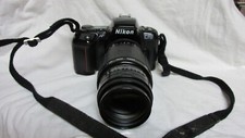 NIKON F-601 QUARTZ DATE CAMERA W/ SIGMA 75-300mm AF LENS