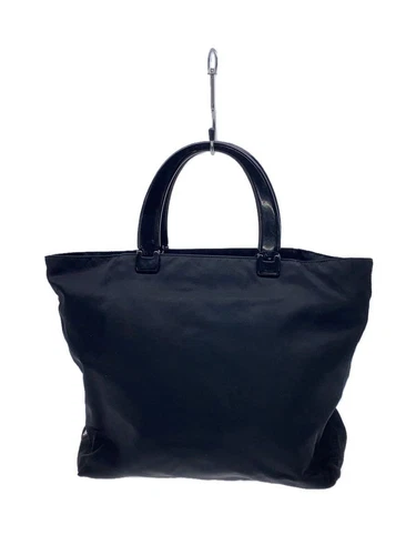 Sac fourre tout PRADA logo triangle nylon poignée plastique noir solide Occasion