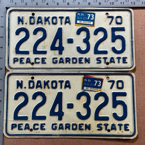 1973 North Dakota license plate pair 224-325 YOM DMV Ford Chevy Dodge 23681
