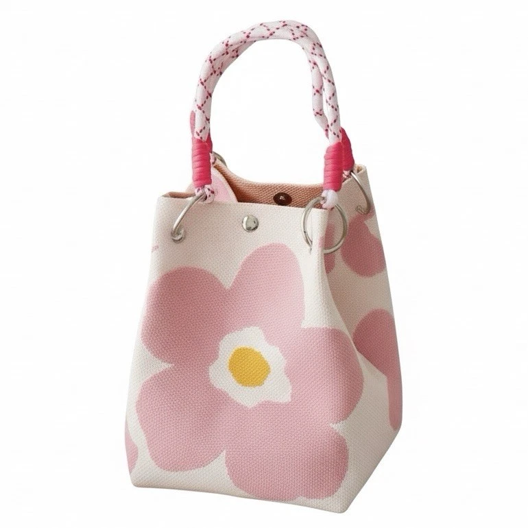 Mini Knitted Bucket Bag In Pale Pink With Braided Handle, Floral Pattern - Image 2 of 4