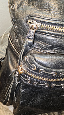apostrophe leather sling backpack Tristan Sling Backpack
