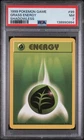 1999 POKEMON BASE SET SHADOWLESS #99 GRASS ENERGY PSA 7